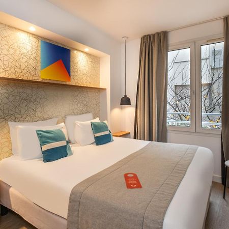 Hotel Izzy Issy-les-Moulineaux Bagian luar foto