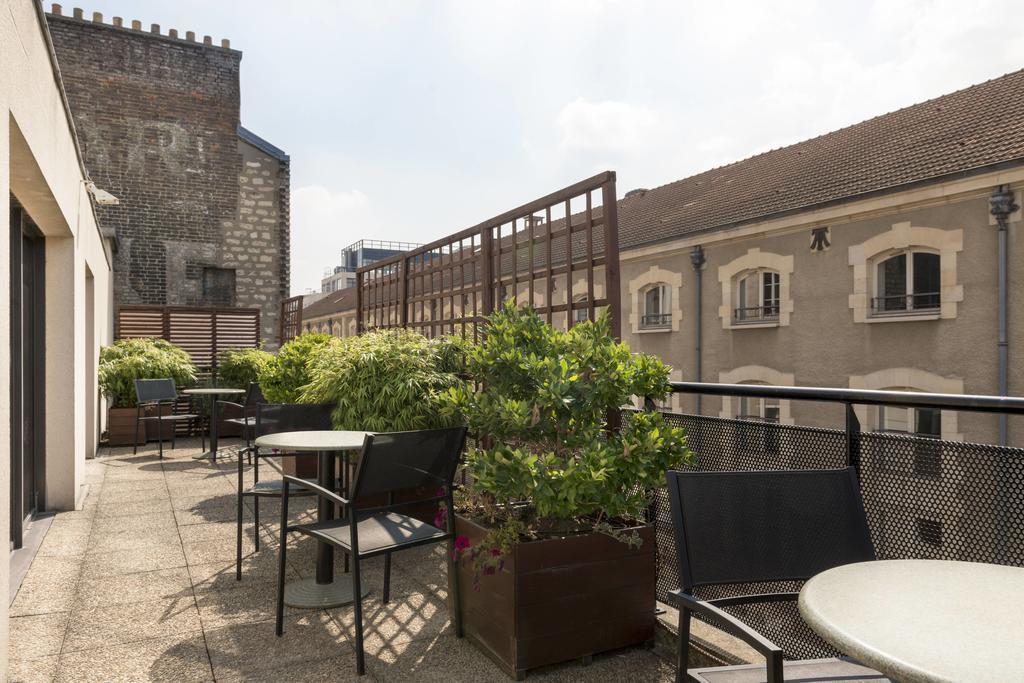 Hotel Izzy Issy-les-Moulineaux Bagian luar foto